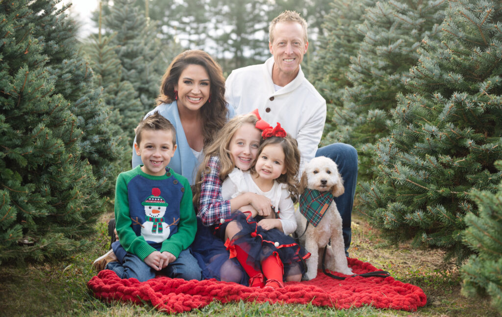 holiday family photos at a tree farm

