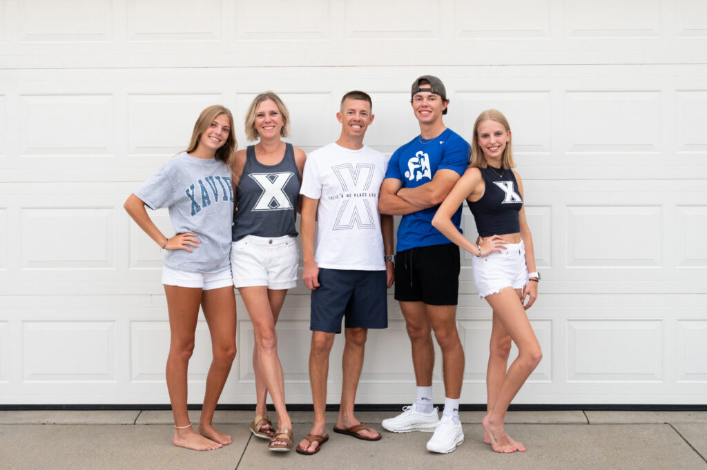 family wearing proudly their school logo